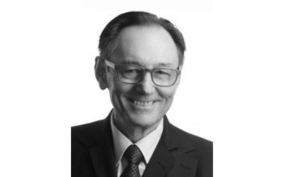 Mario D’Orazio wearing glasses, smiling