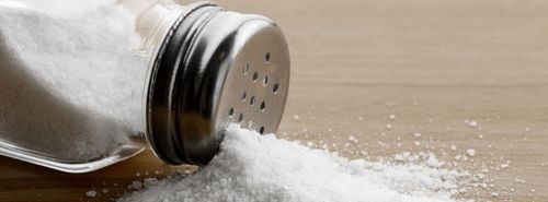 Salt shaker split on a table